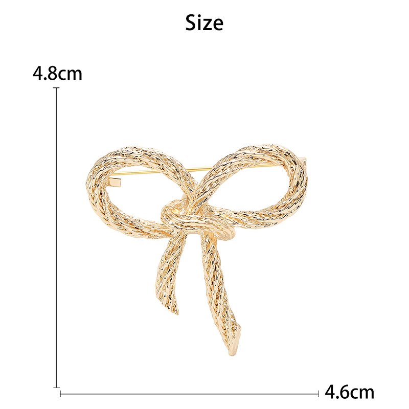 European and American bow twist face brooch fashion simple retro atmosphere women's clothing accessories pin wholesale